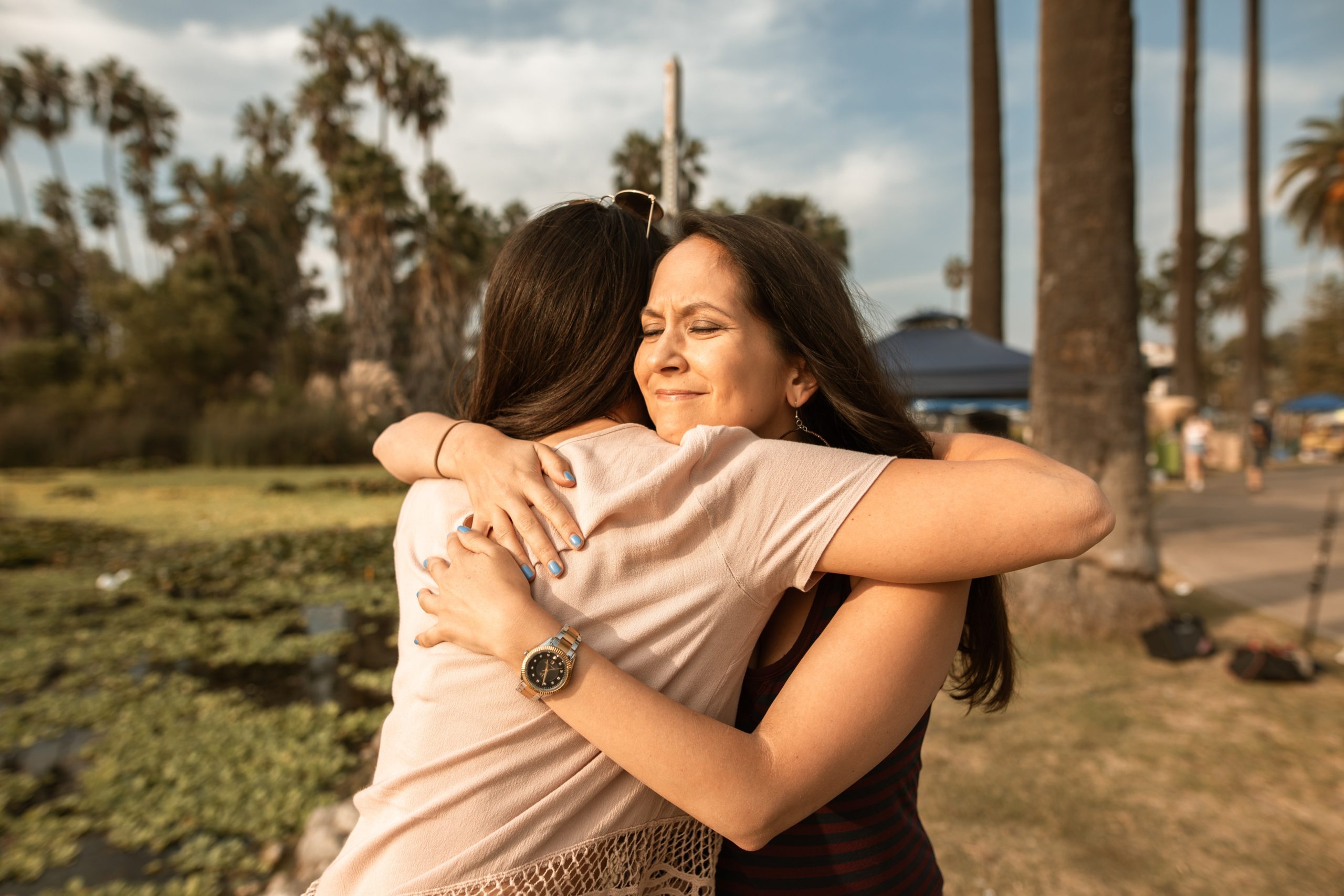 Mother hugging her daughter